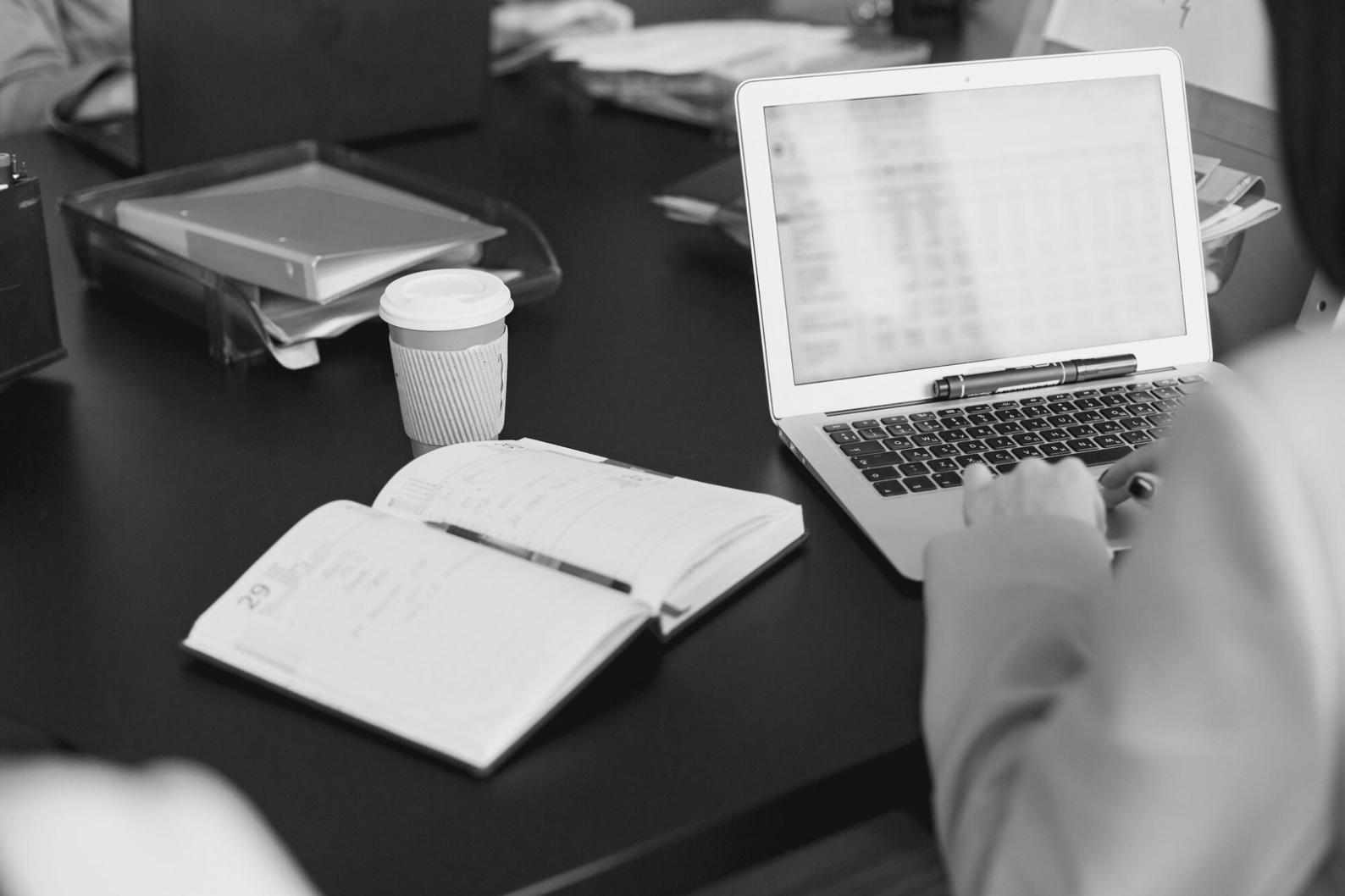 Professional tax strategy consultation meeting with financial documents and analysis